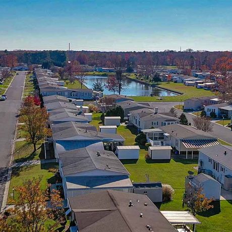 Aerial view of Cranberry run with homes and pond